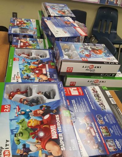 Boxes of toy superheroes and characters